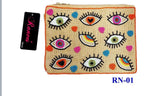 Jute small clutch with multiple eyes