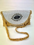 natural jute clutch with eye