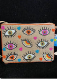 Jute small clutch with multiple eyes