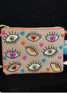 Jute small clutch with multiple eyes