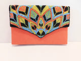 Orange silk clutch