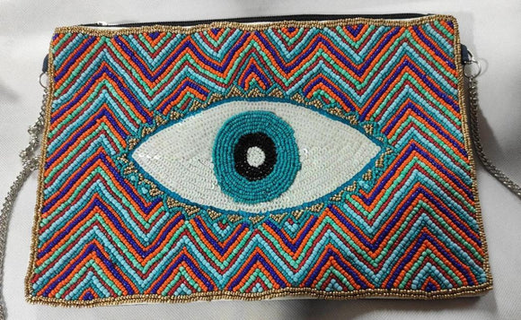 Turquoise eye messenger bag