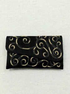 Embroidered clutch