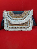 Coin boho clutch